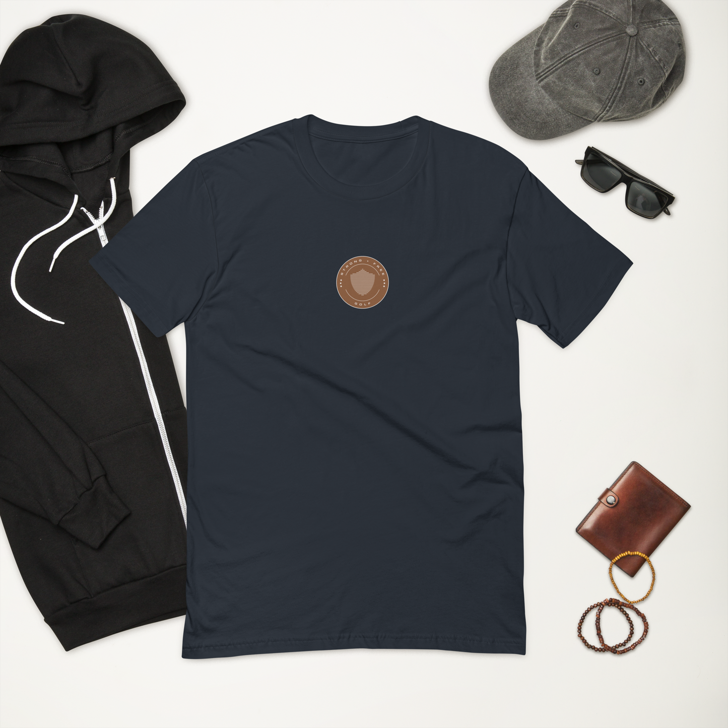 Men's golf tee, various colors. S+F signature shield logo design, reverse brown crest.