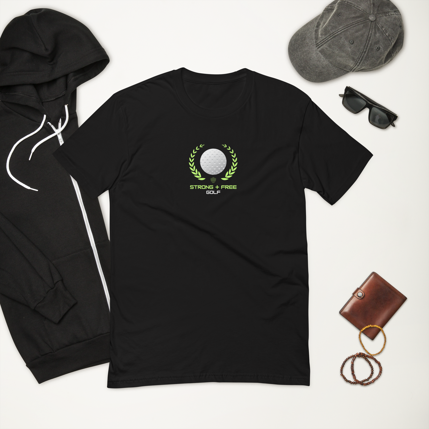 Men's golf tee, black. S+F custom logo design, golf crest I.