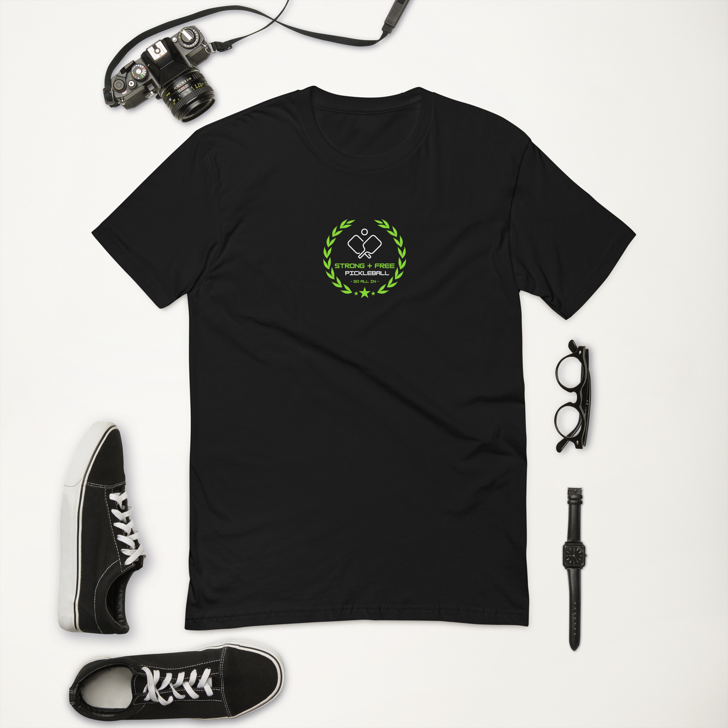 Men's tee, black. S+F custom pickleball logo design, green crest.